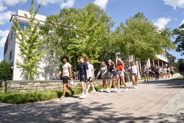 Students walking at Convocation 2022