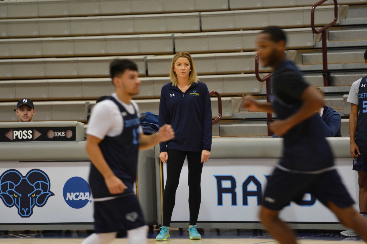 Assistant coach Stephanie Carideo supervises practice as the Rams prep for the home opener versus Saint Anselm.