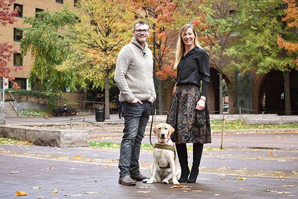eashes of Valor cofounders Jason Haag and Danique Masingill presented at Jefferson with Maggie, a 9-month-old Labrador in training