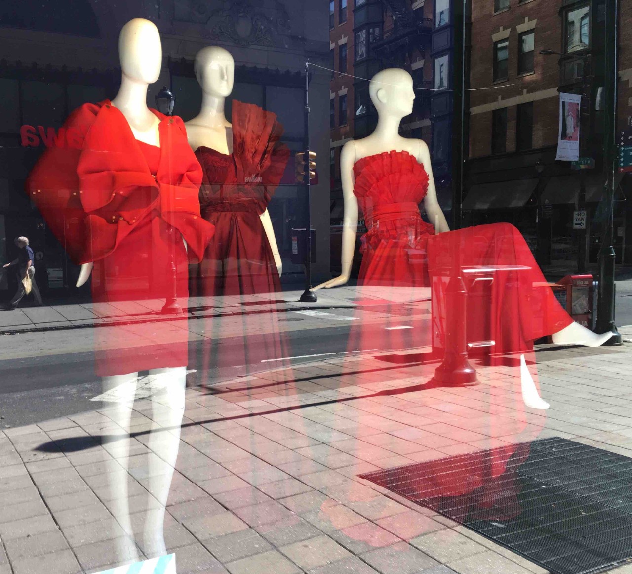 Red dresses on display at Macy's window