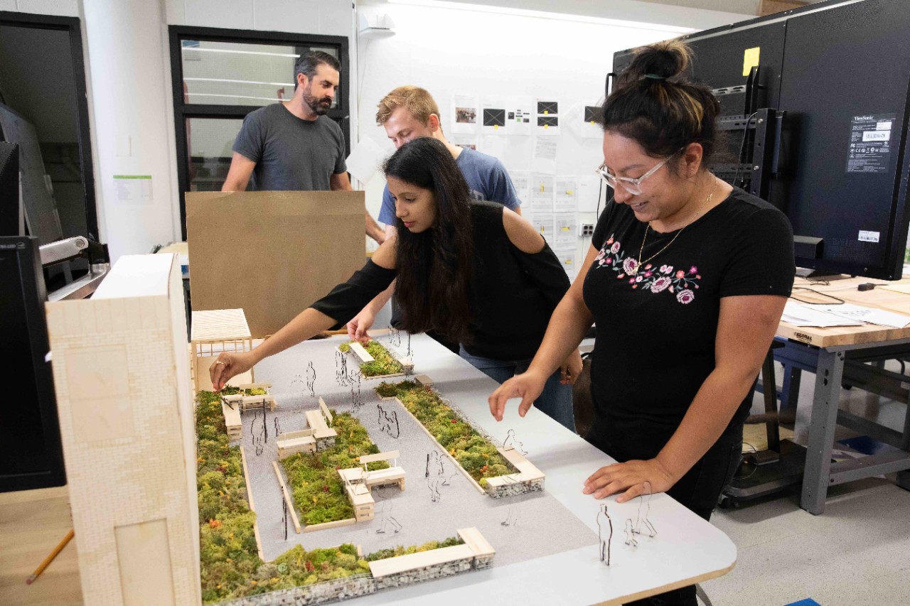 Jefferson students Surabhi Schroff, Hunter Dyson, Teddy Pickering and Shelby Montesdeoca work on mockups of the first Park in a Truck in Mantua. 