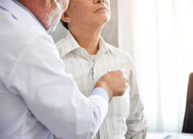 Senior Doctor is examining An Asian patient with stethoscope. Medical and health concepts. Lung, Cancer, pneumonia.