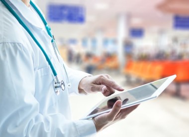 Healthcare professional medical doctor using tablet and smartphone for consult patient via online: Physician working tele-consultation: Hospital e-healthcare professionalism Digital health concept.