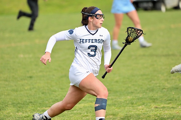 Women’s lacrosse player Erin Eckert on the field.