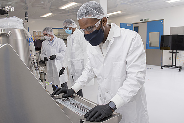 Jefferson Institute for Bioprocessing student Nafees Norris with colleagues