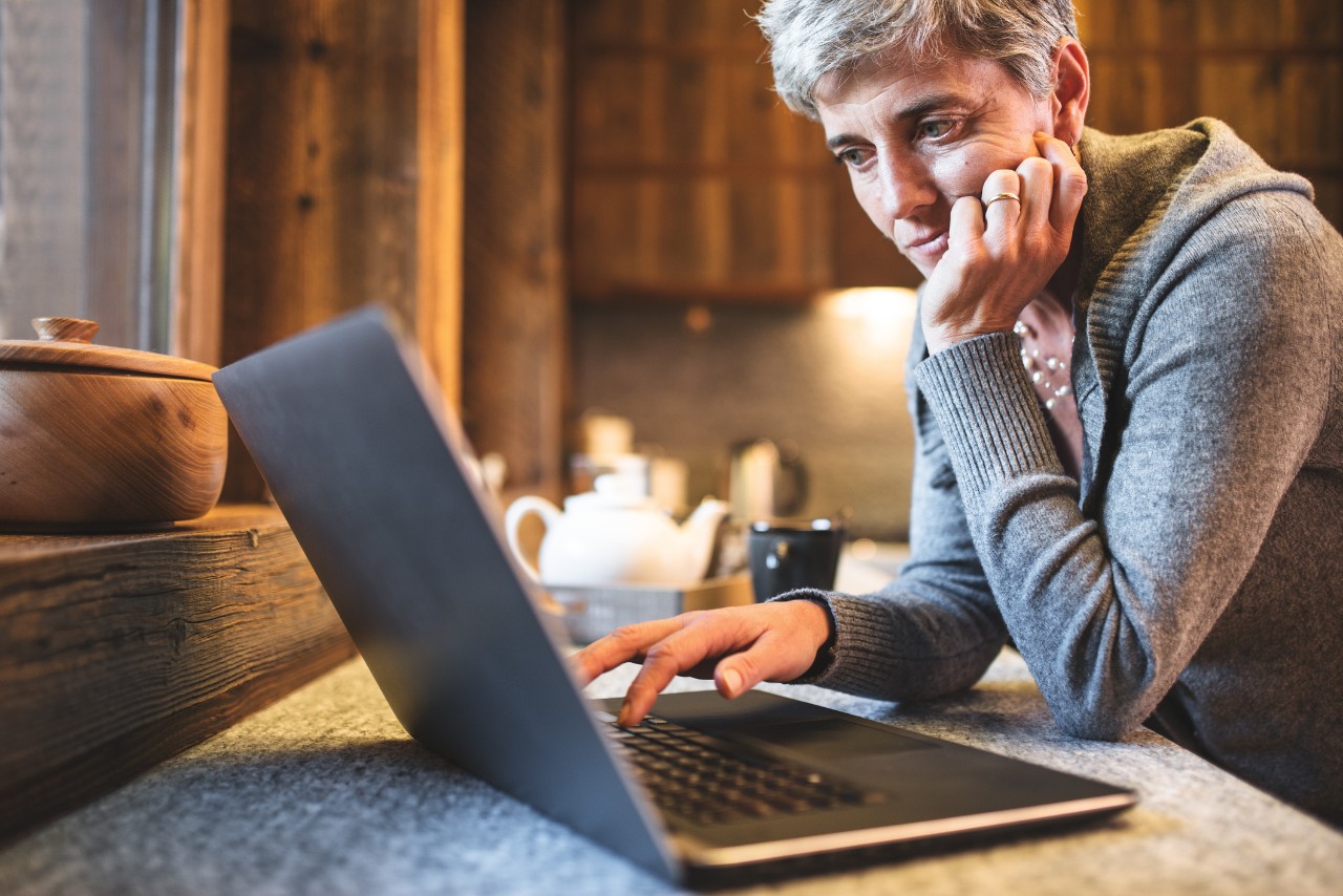 Student studying at a laptop