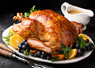 Festive celebration roasted turkey with gravy for Thanksgiving or Christmas