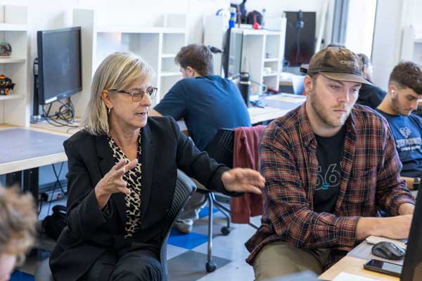 Professor with student