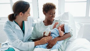 Woman talking to patient