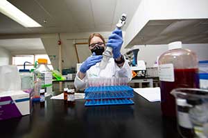 hand holding dna strand