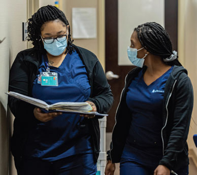 Two female Thomas Jefferson University College of Nursing Students.