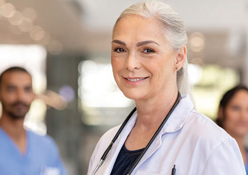 Female Doctor wearing a stethescpope. 