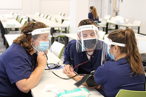 Jefferson Nursing students with masks and visors