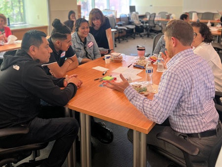 Participants in the practice Design Thinking session brainstormed solutions.