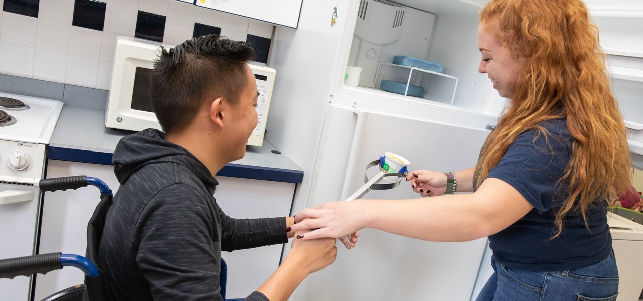  Student working in occupational therapy program