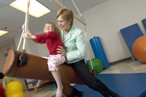 Occupational therapist with a child