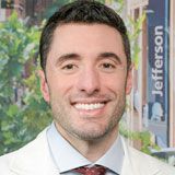 Rubin Rhoades, MD