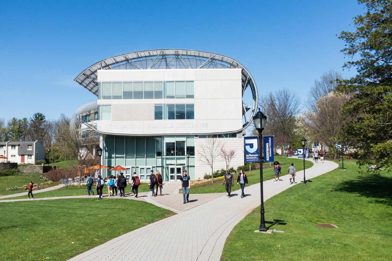  Freshman undergraduate students walking on the East Falls Campus at Thomas Jefferson University.