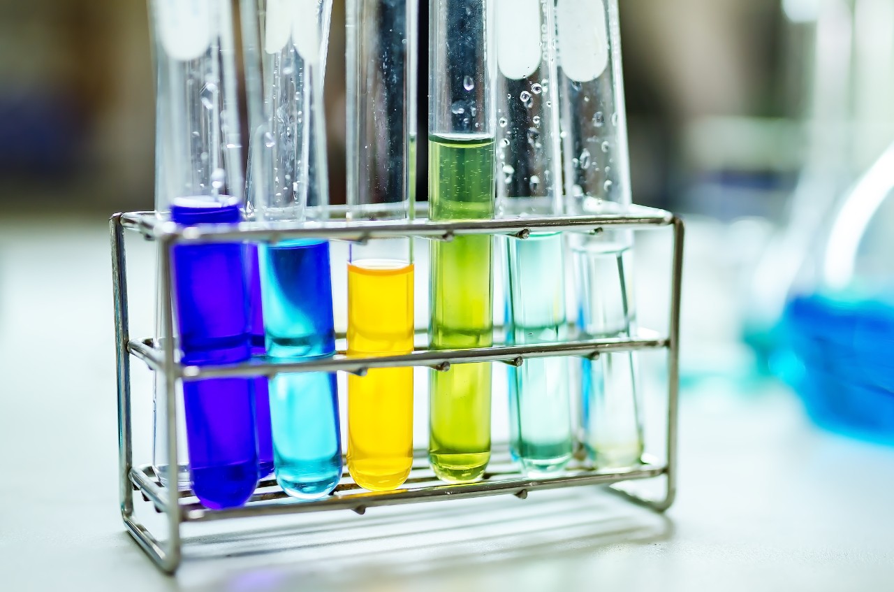 The tubes in the laboratory background. Glassware and biology equipment