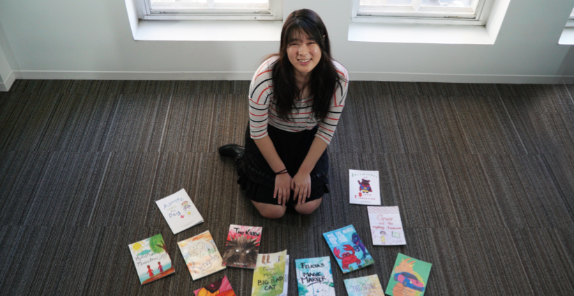 Alicia with her books