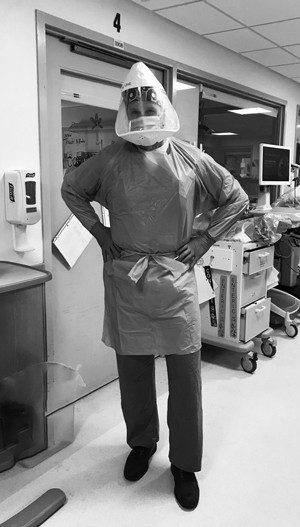 Dr. Kane in the ER in head-to-toe PPE