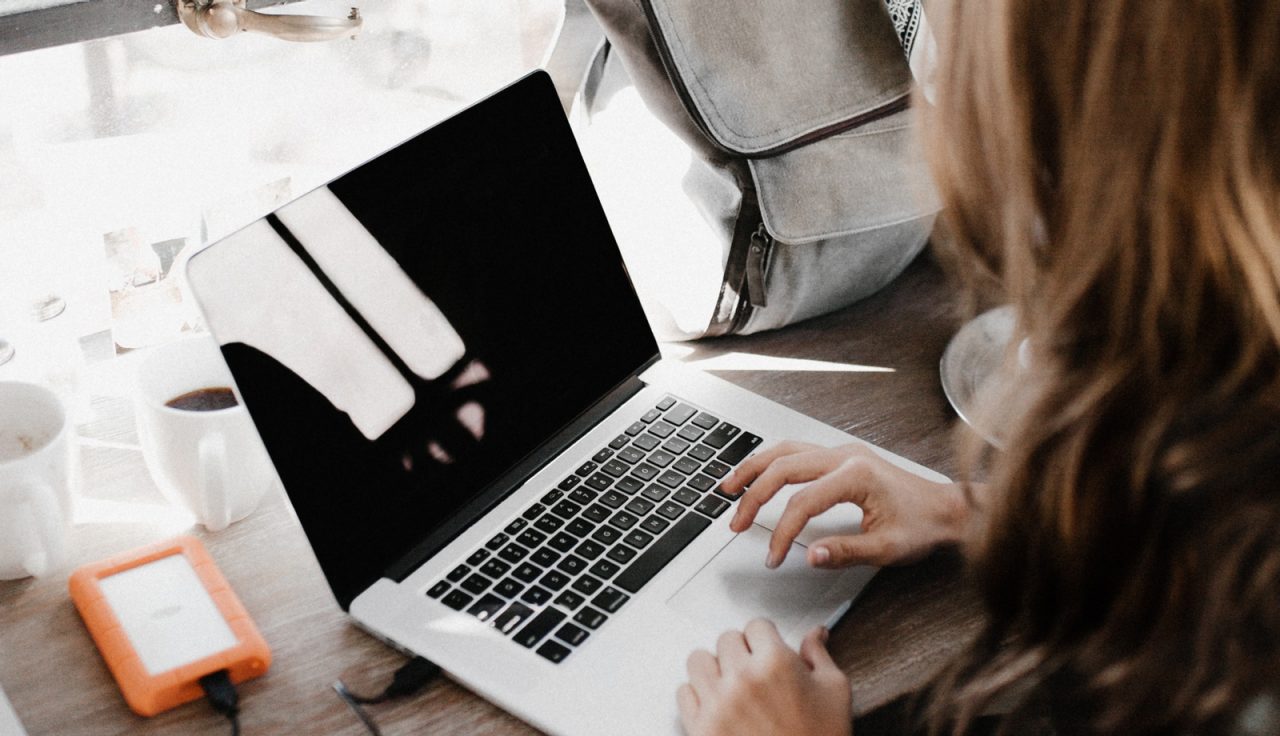 Student sitting at laptop