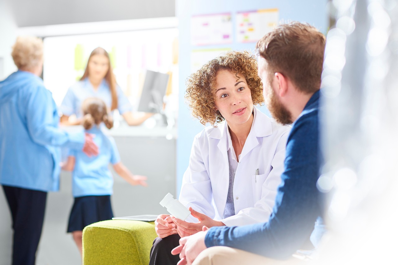 pharmacist speaking with a patient