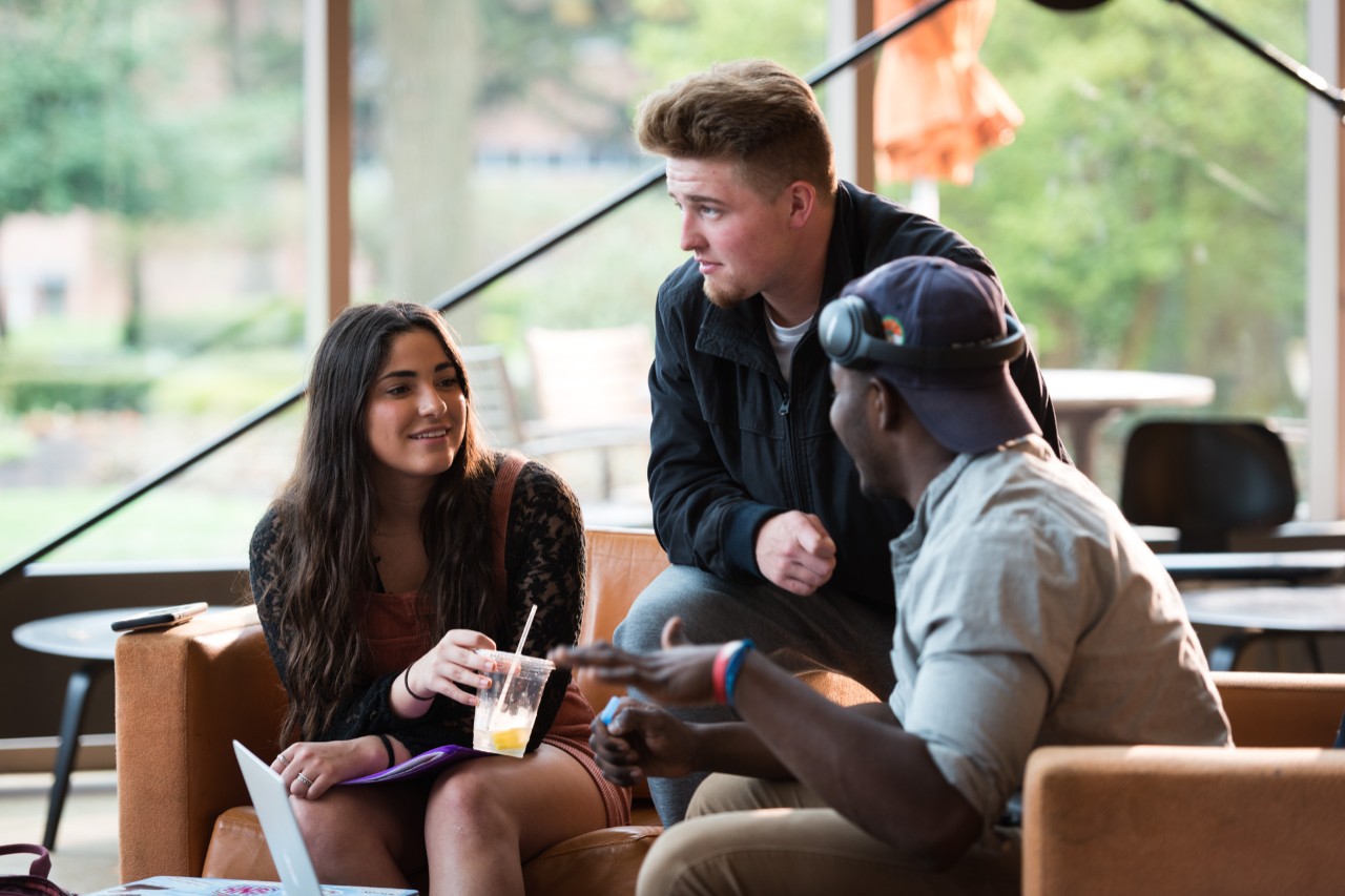 Students sitting in a lounge