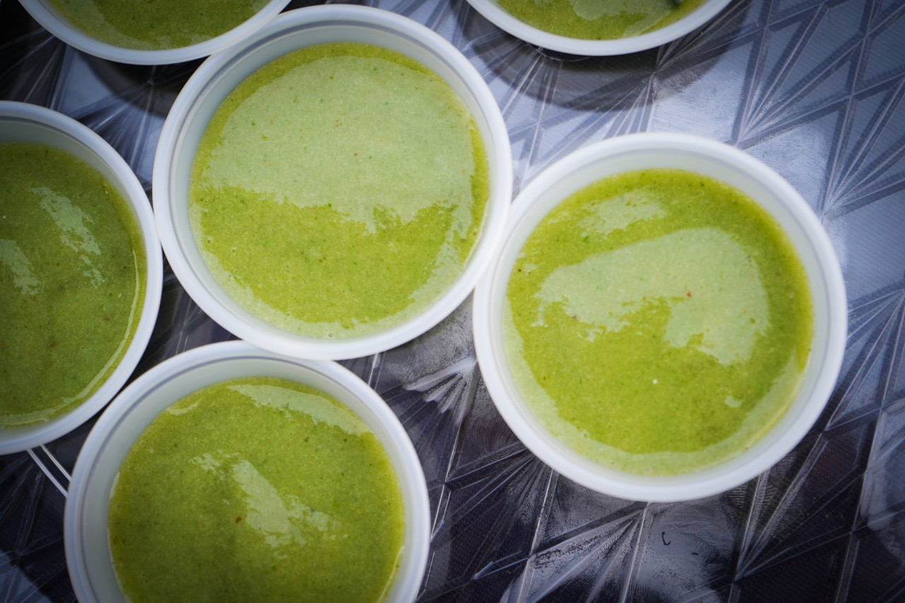Cups of smoothies on a table.