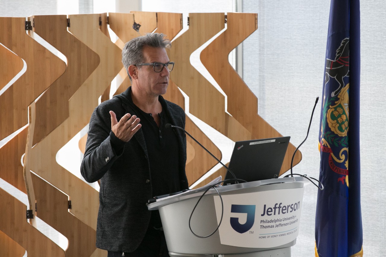 Richard Florida speaks at the podium