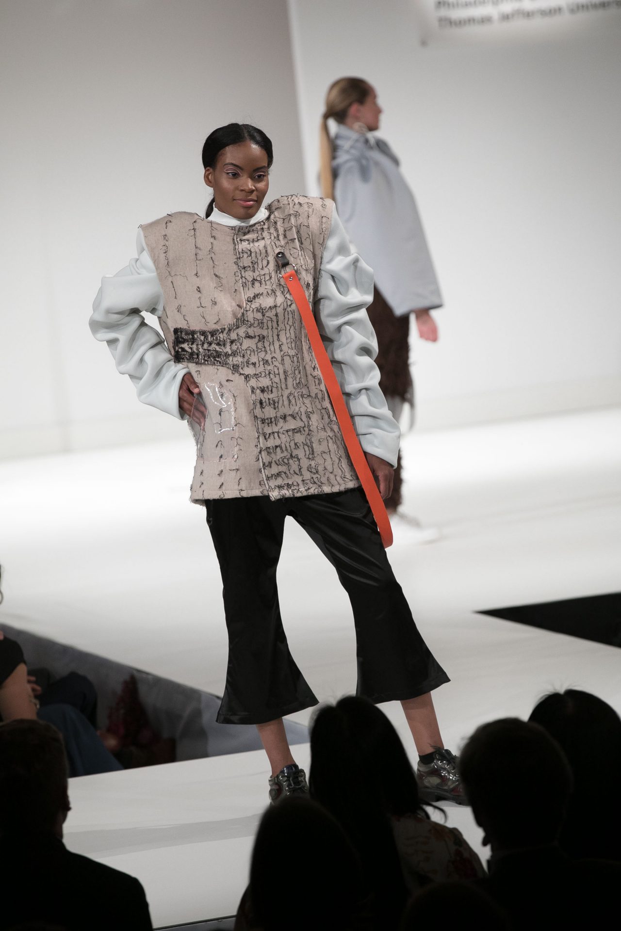 Model walks down the runway