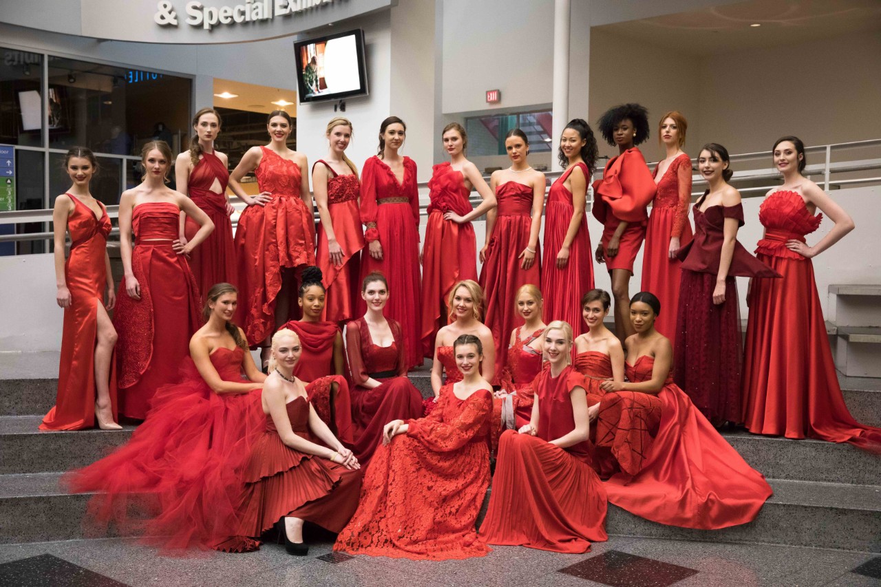 Models show off their red dresses