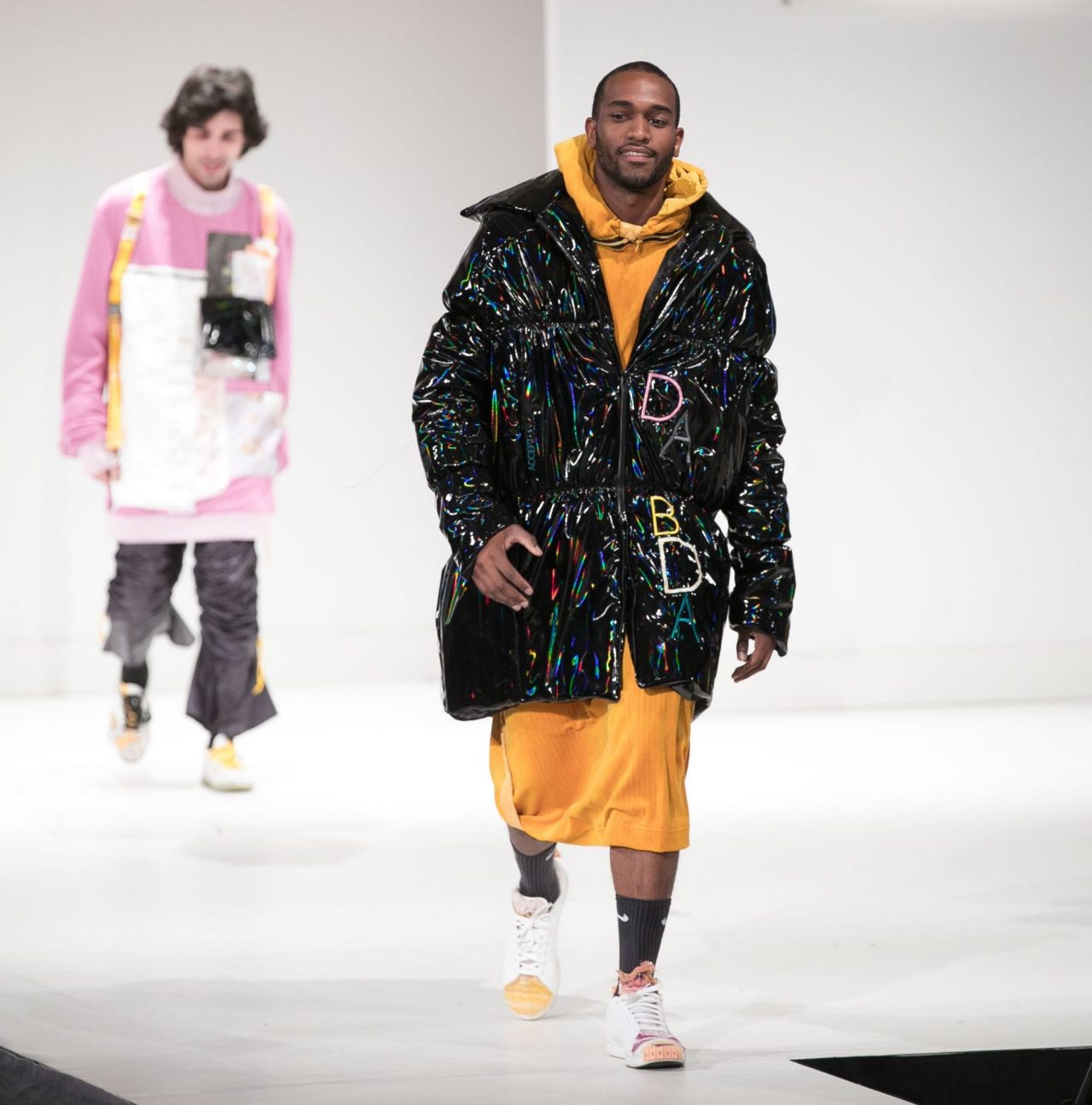 Model walking down the runway