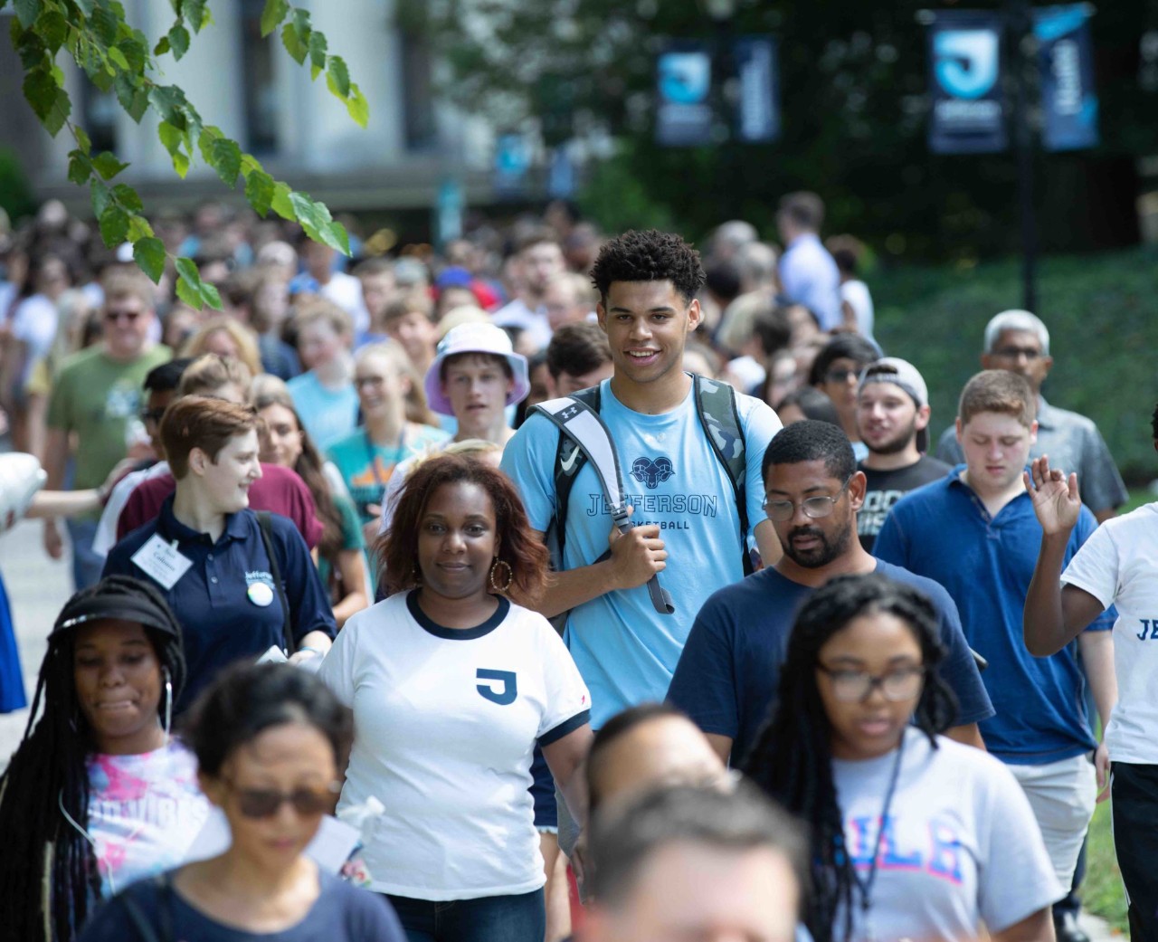 New students walking into convocation