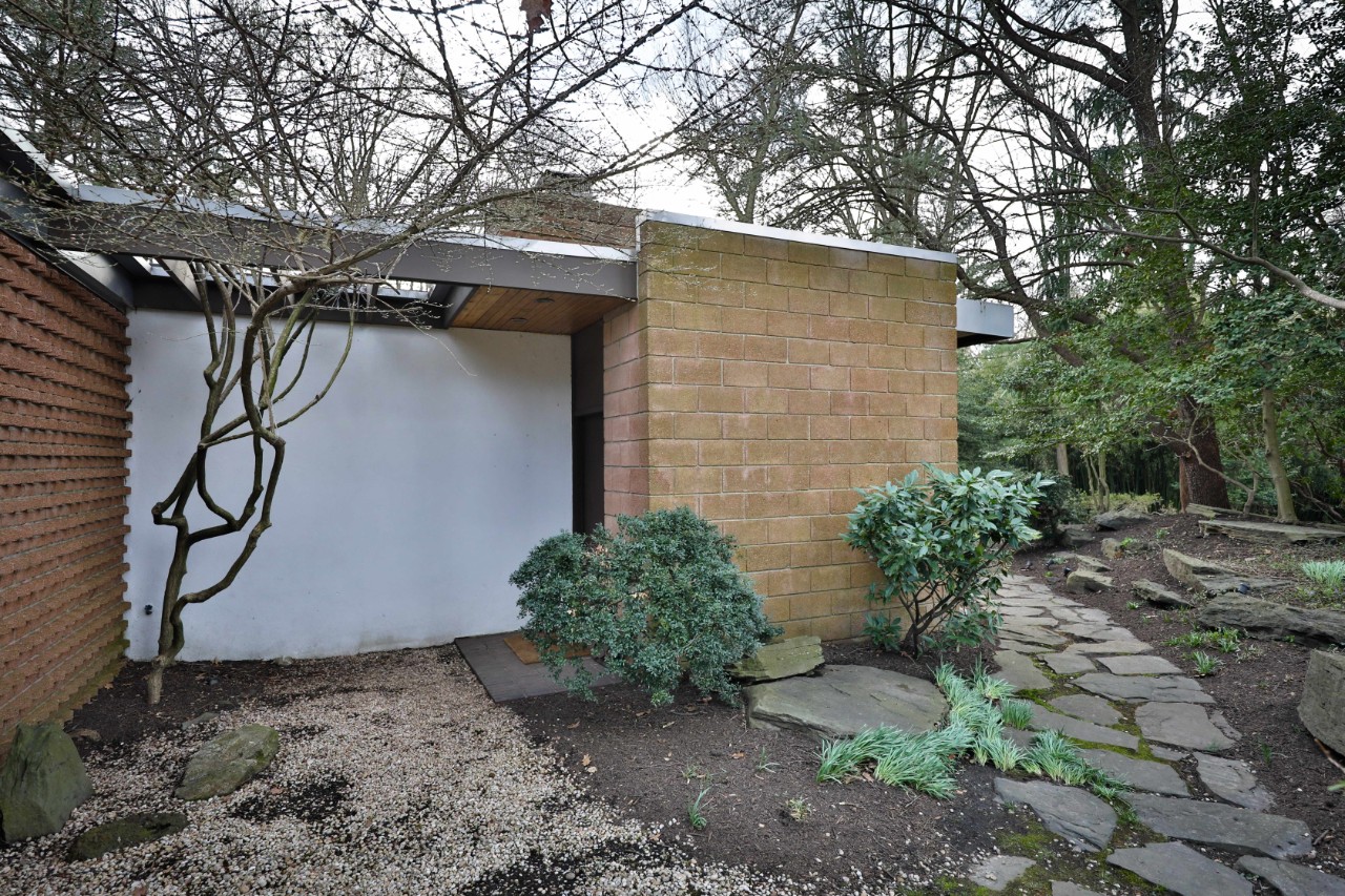 The entrance to the Hassrick House is hidden, adding drama to the views revealed upon entering the home.
