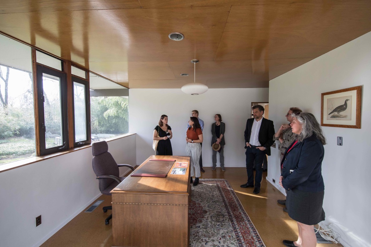 College of Architecture and the Built Environment students Olivia DeAgro and Adriana Hernandez-Palomino guide people through the Hassrick House, showing the original kids’ playroom, now with a desk and study furnishing. Over 100 guests toured the home in a special limited event on April 8.