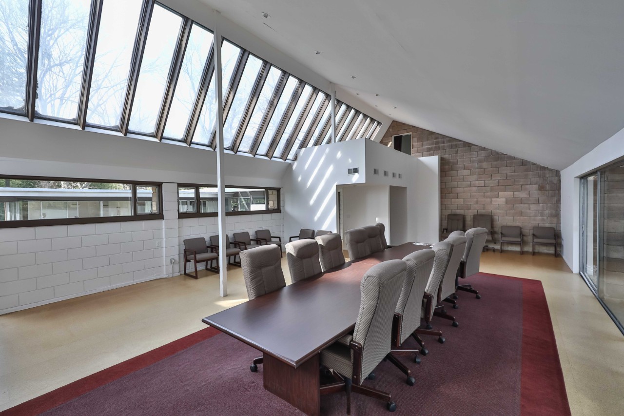 Irwin Stein designed the house addition to be a studio for the original owner and artist Kenneth Hassrick.