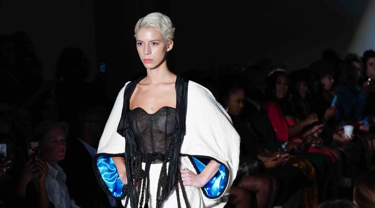 model walking down runway