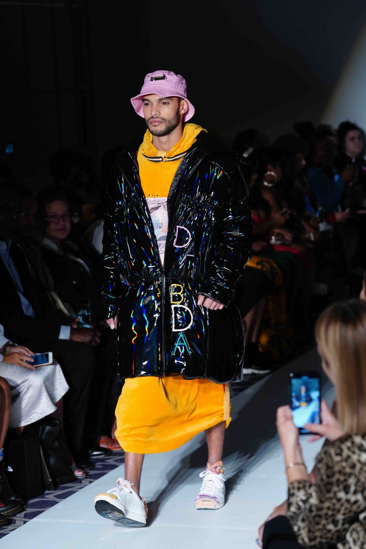 model walks down the runway