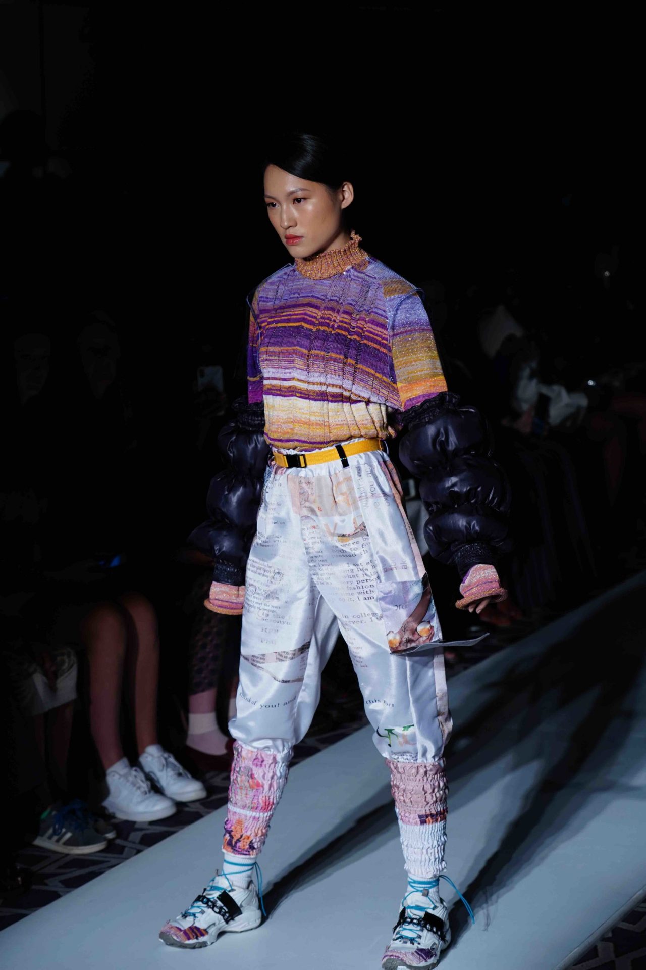 model walks down the runway