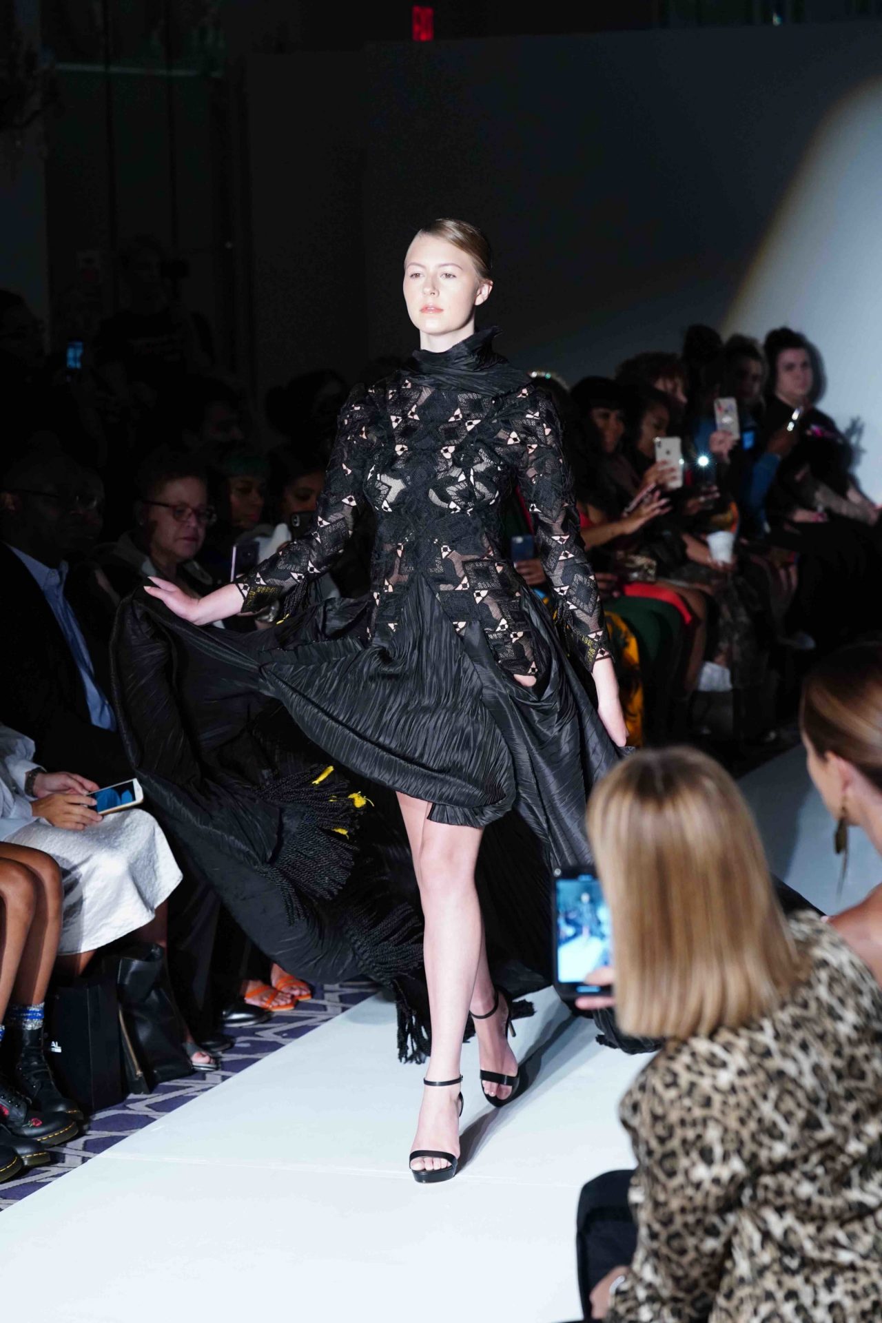 model walks down the runway