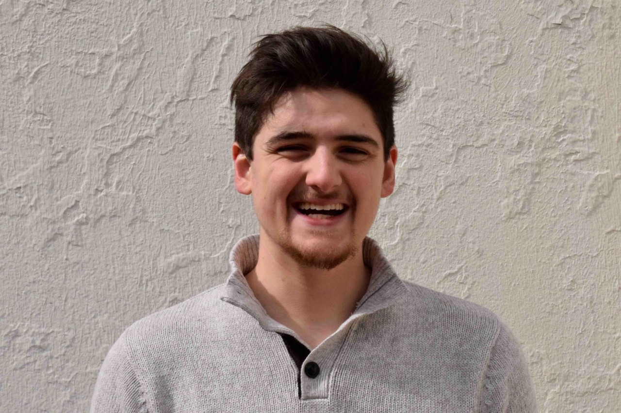 Headshot of Adam Hoover