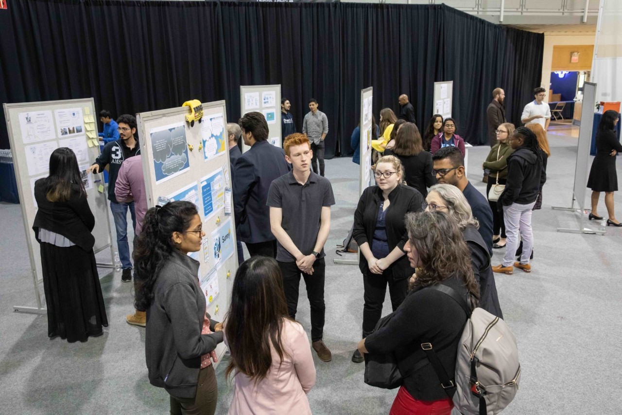 A group of students presents their project at Nexus Maximus
