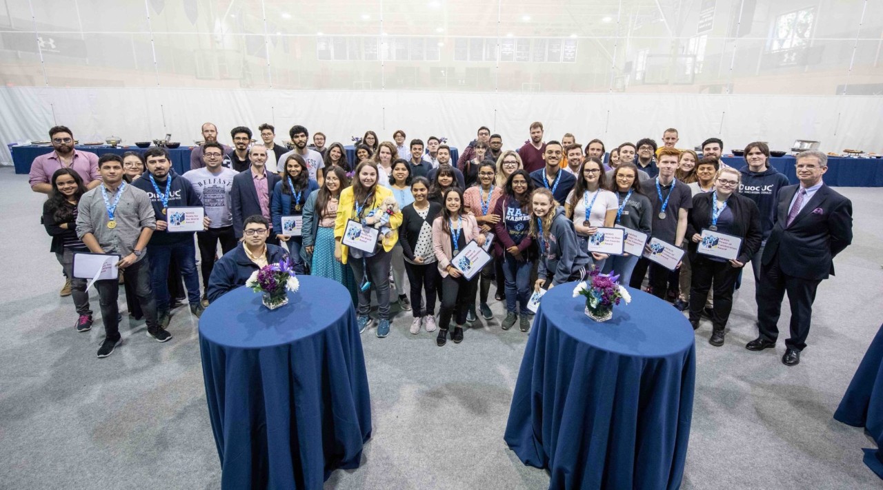 The 60 participants in Nexus Maximus pose together