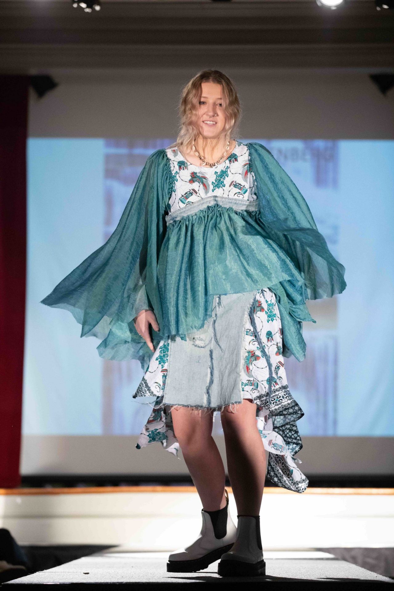 Model walking down runway