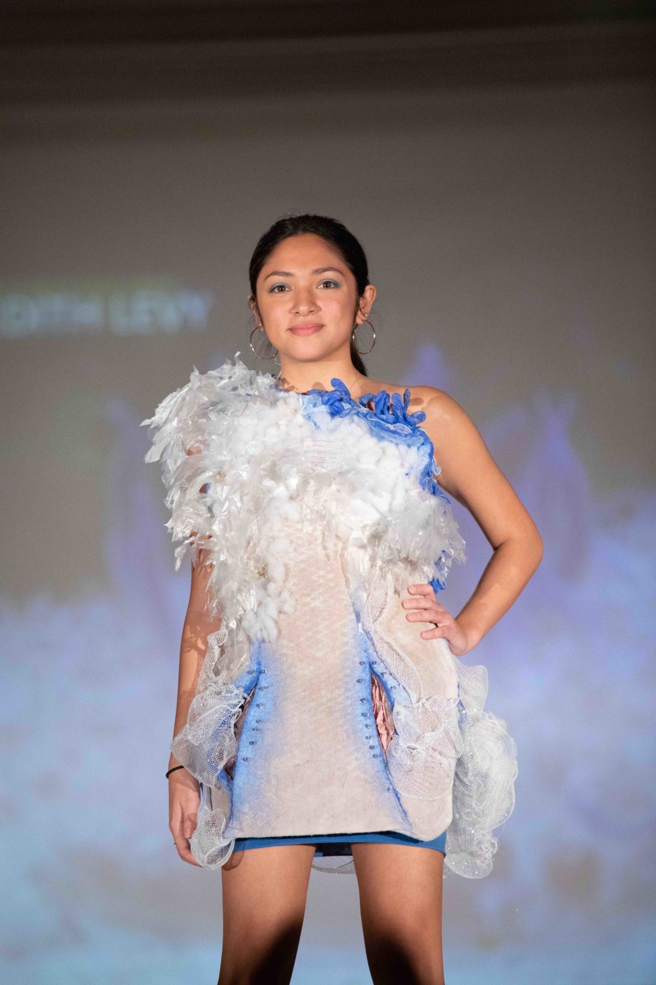 Model walking down runway