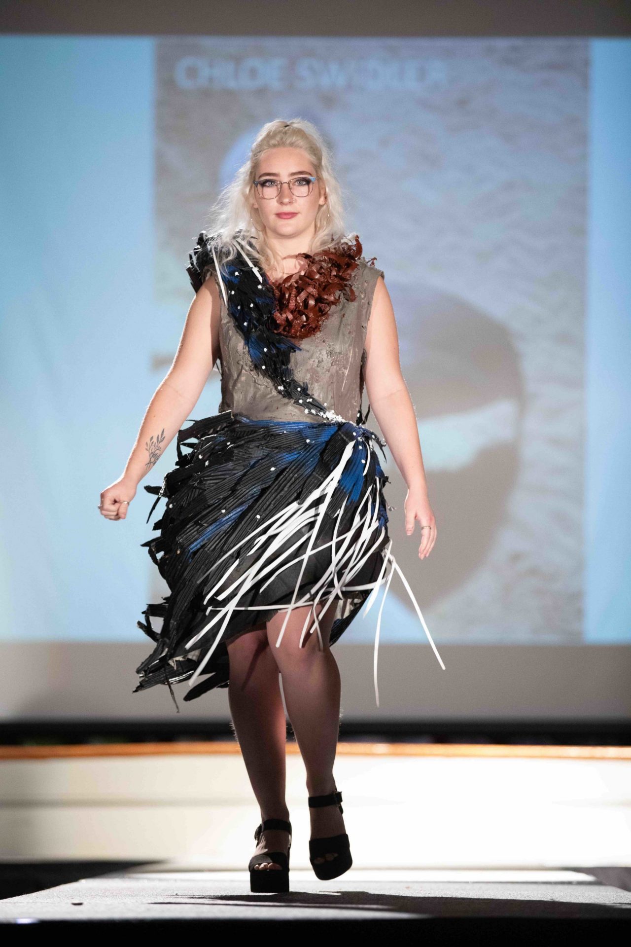 Model walking down runway