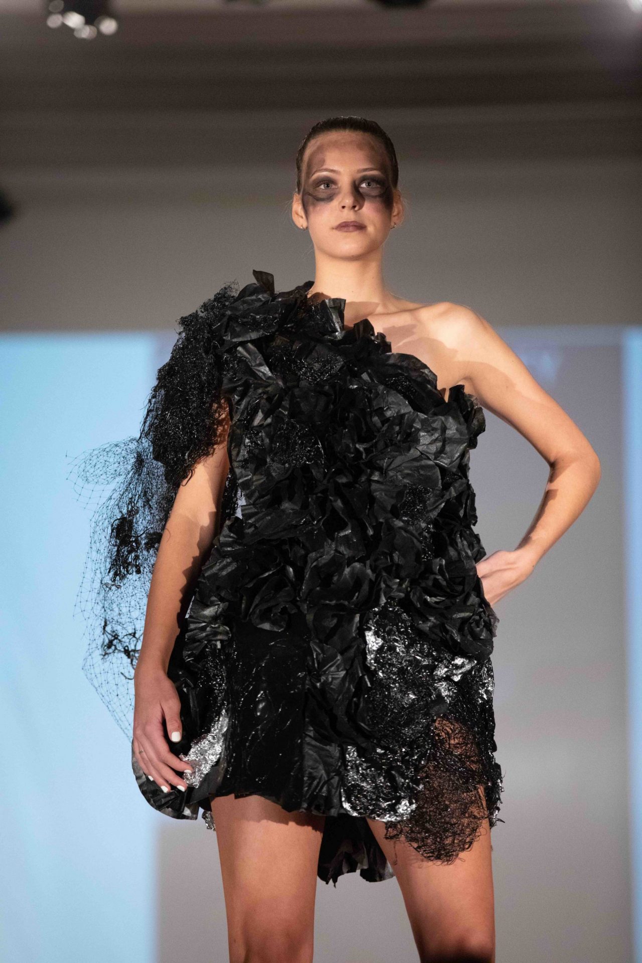 Model walking down runway