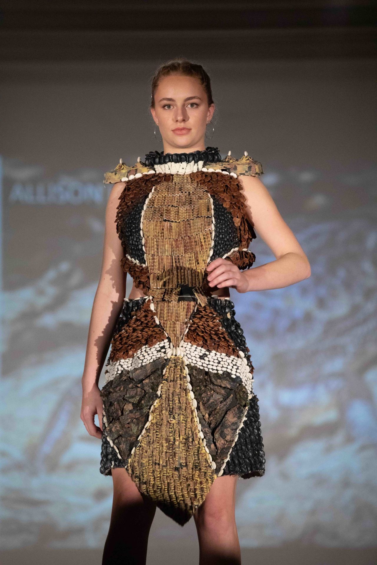 Model walking down runway