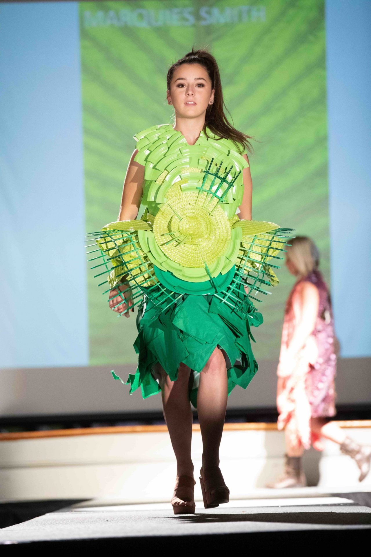 Model walking down runway